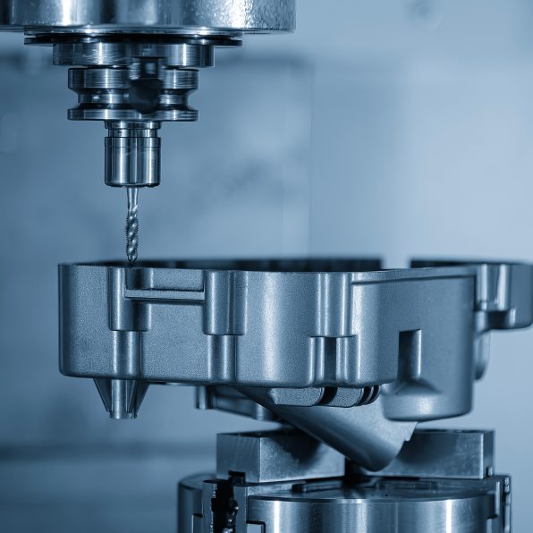 The aluminum gear case parts tapping process on CNC milling machine with tapping holder in the light blue scene.