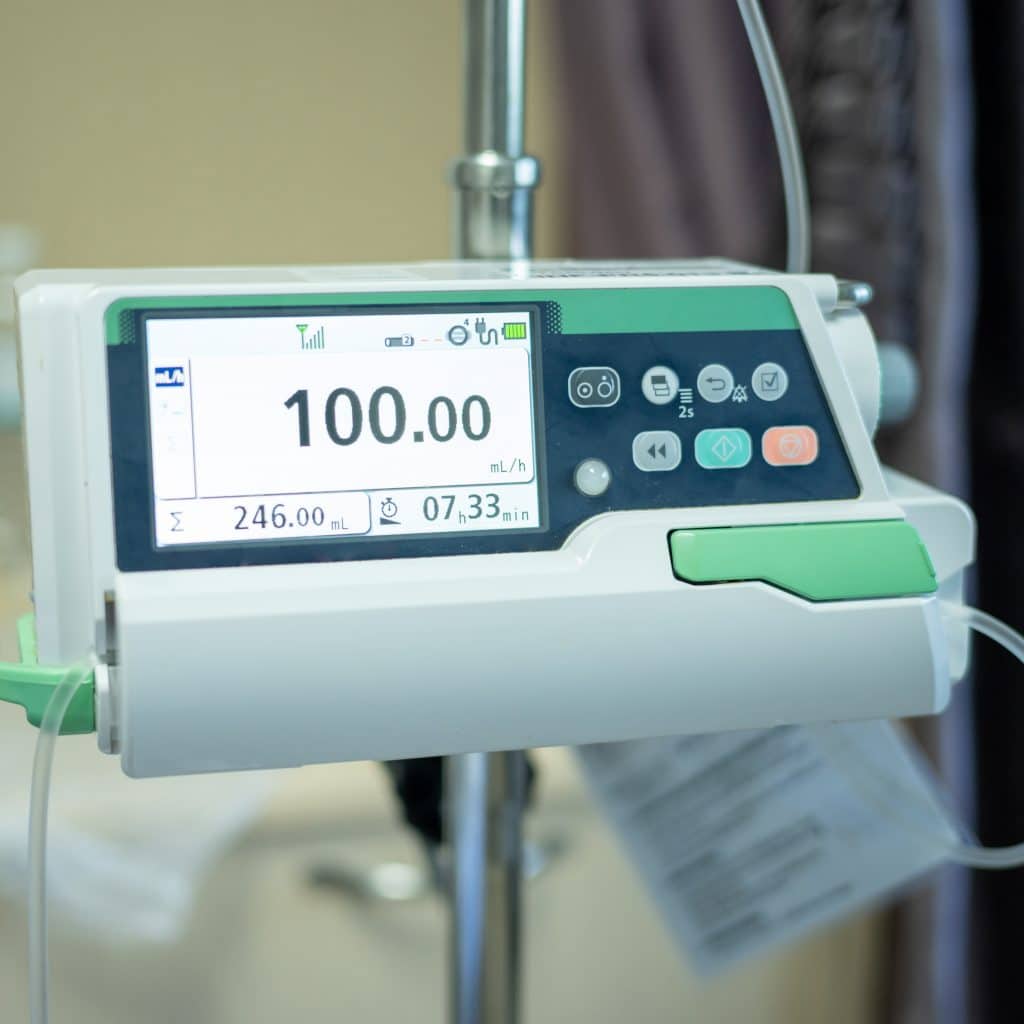 Close up of an external infusion pump is a medical device used t