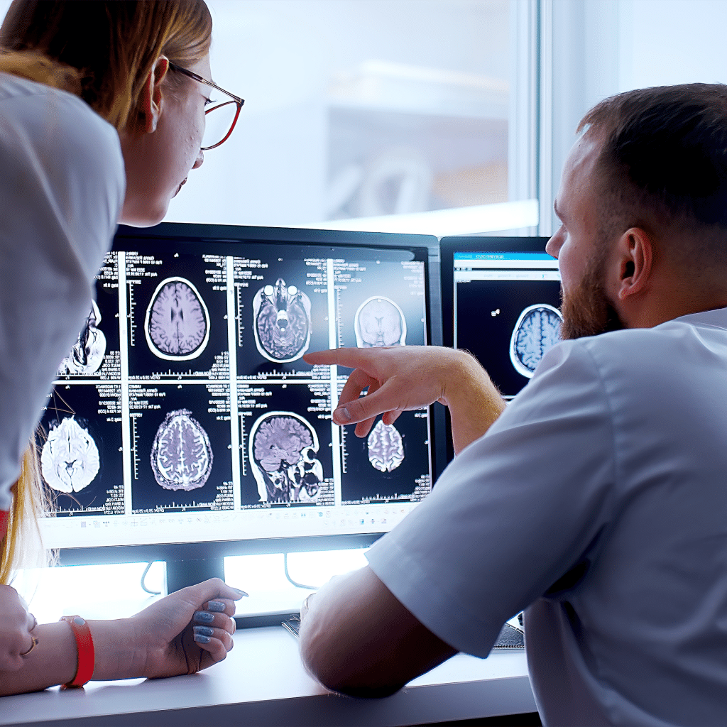 Techs Looking at medical screen
