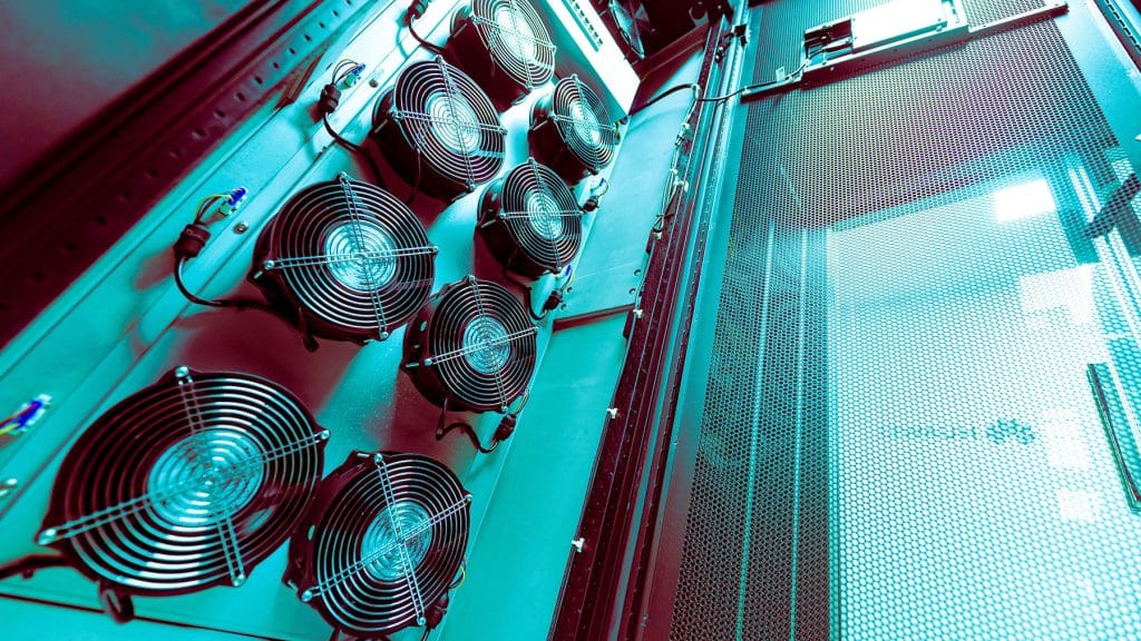 This photo showcases a modern cooling system featuring multiple fans, essential for maintaining optimal temperatures in a data center environment.